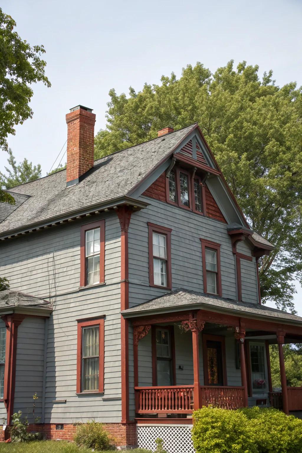 Grey siding and scarlet brick for a timeless, classic appearance.