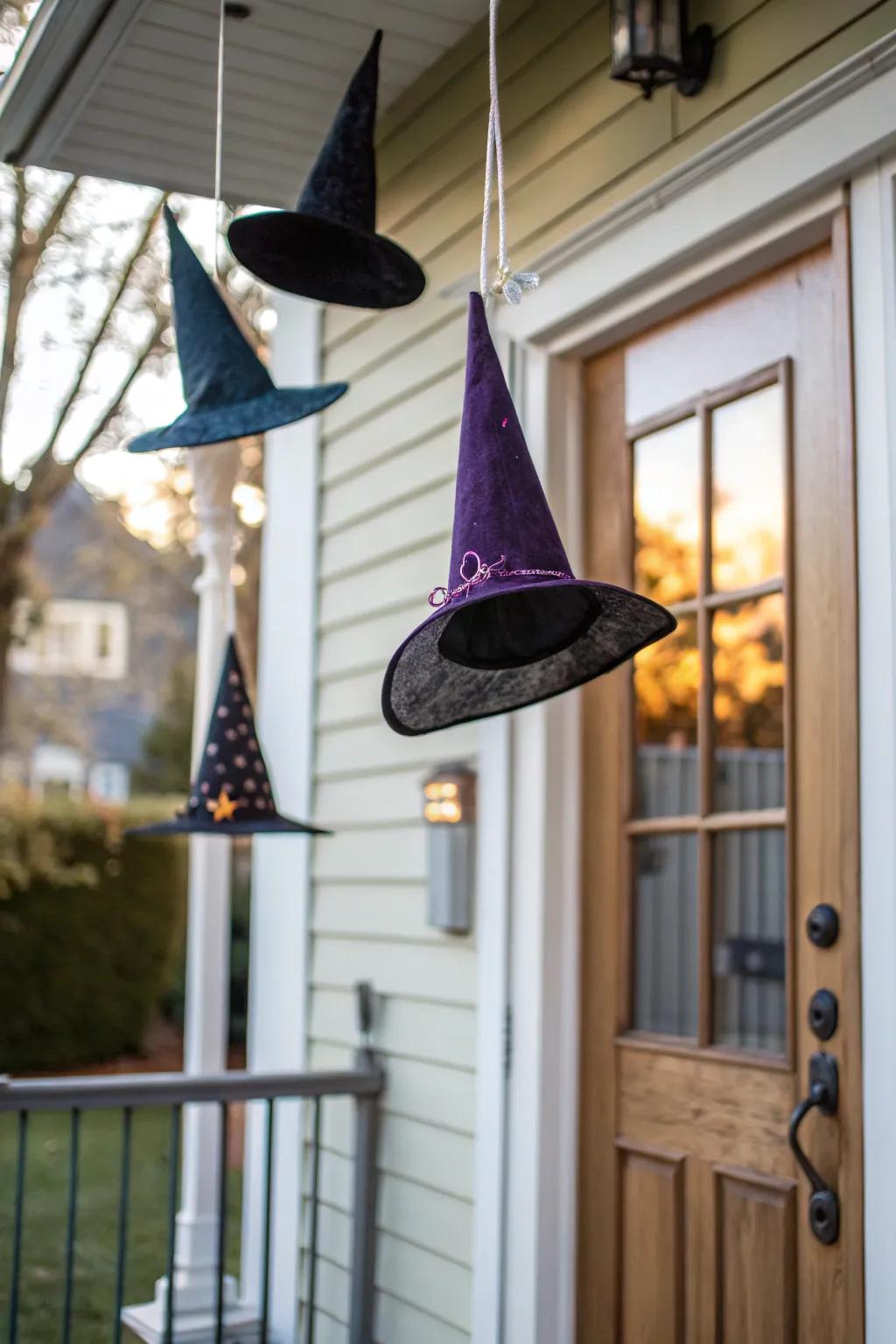 Floating witch hats create a magical Halloween display.