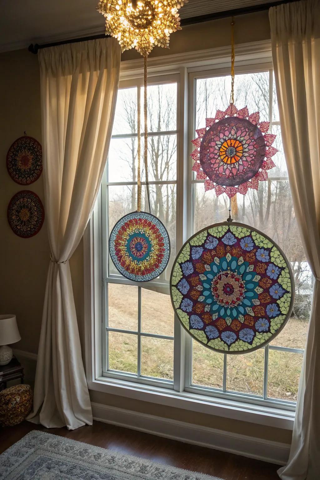 Mandala suncatchers casting colorful patterns from a window.