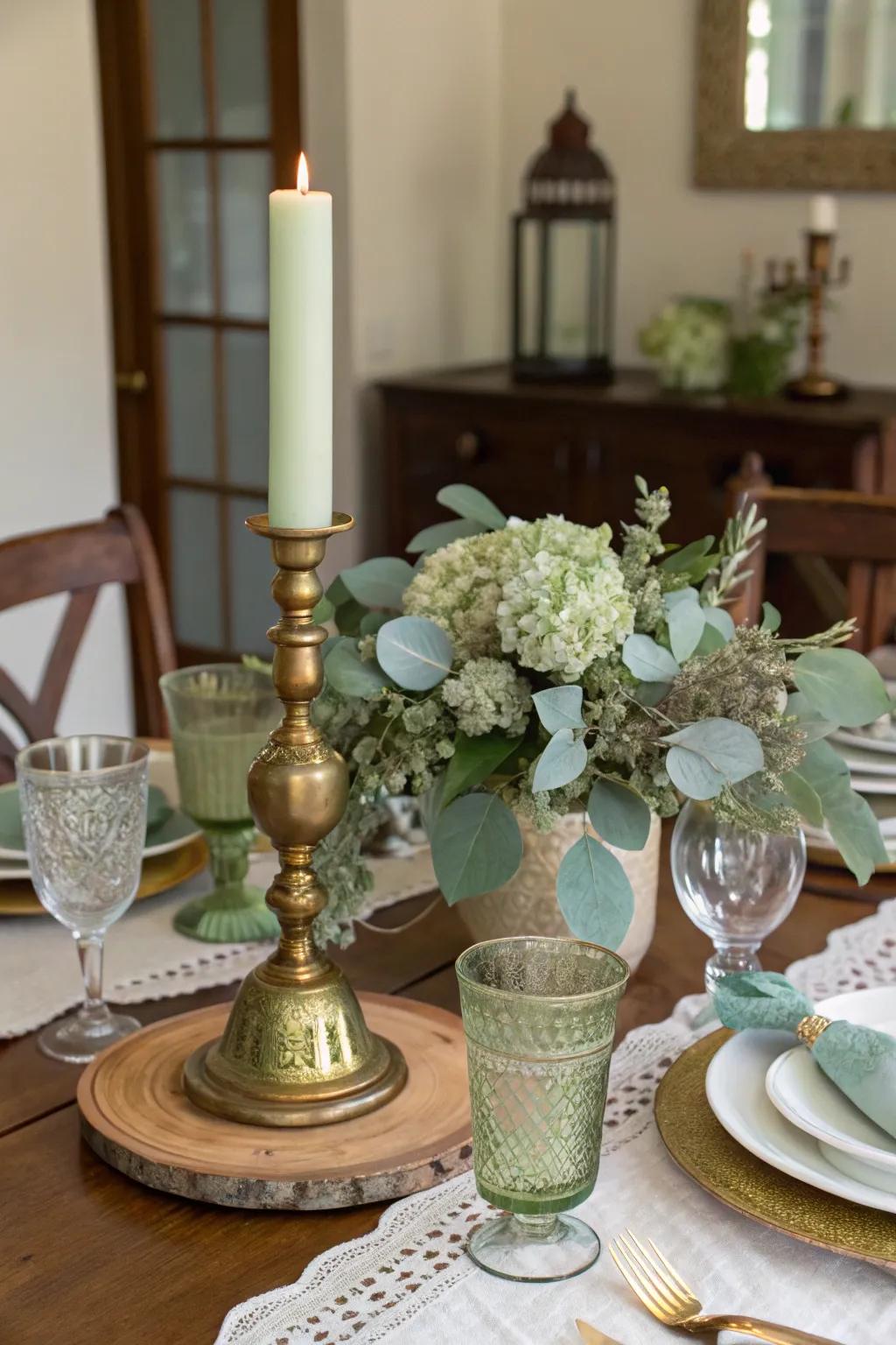 Brass accents add vintage charm to your sage green centerpiece.