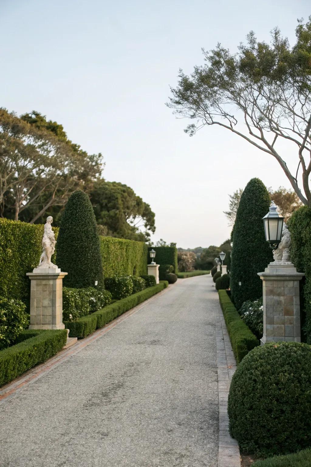 Decorative elements within hedges adding a personal and unique touch to a driveway.