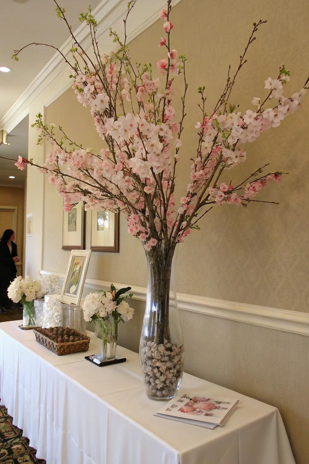 A stunning seasonal branch display with cherry blossoms.