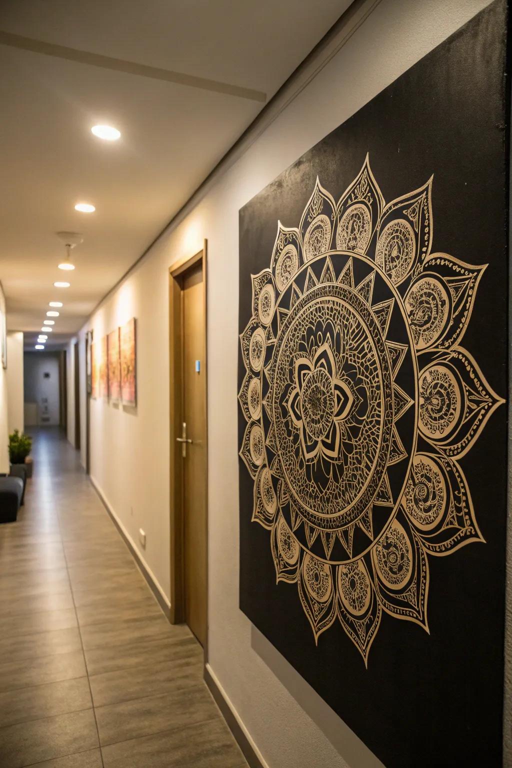 A metallic mandala design on black canvas creating a striking hallway focal point.