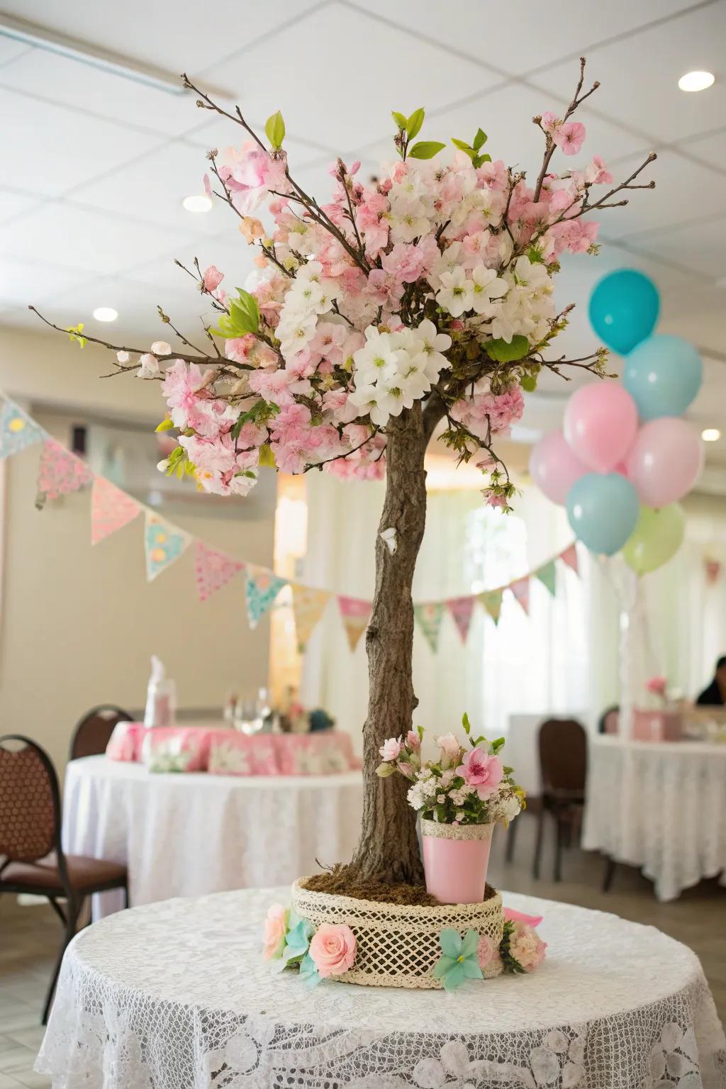 A blooming tree centerpiece with pastel flowers.