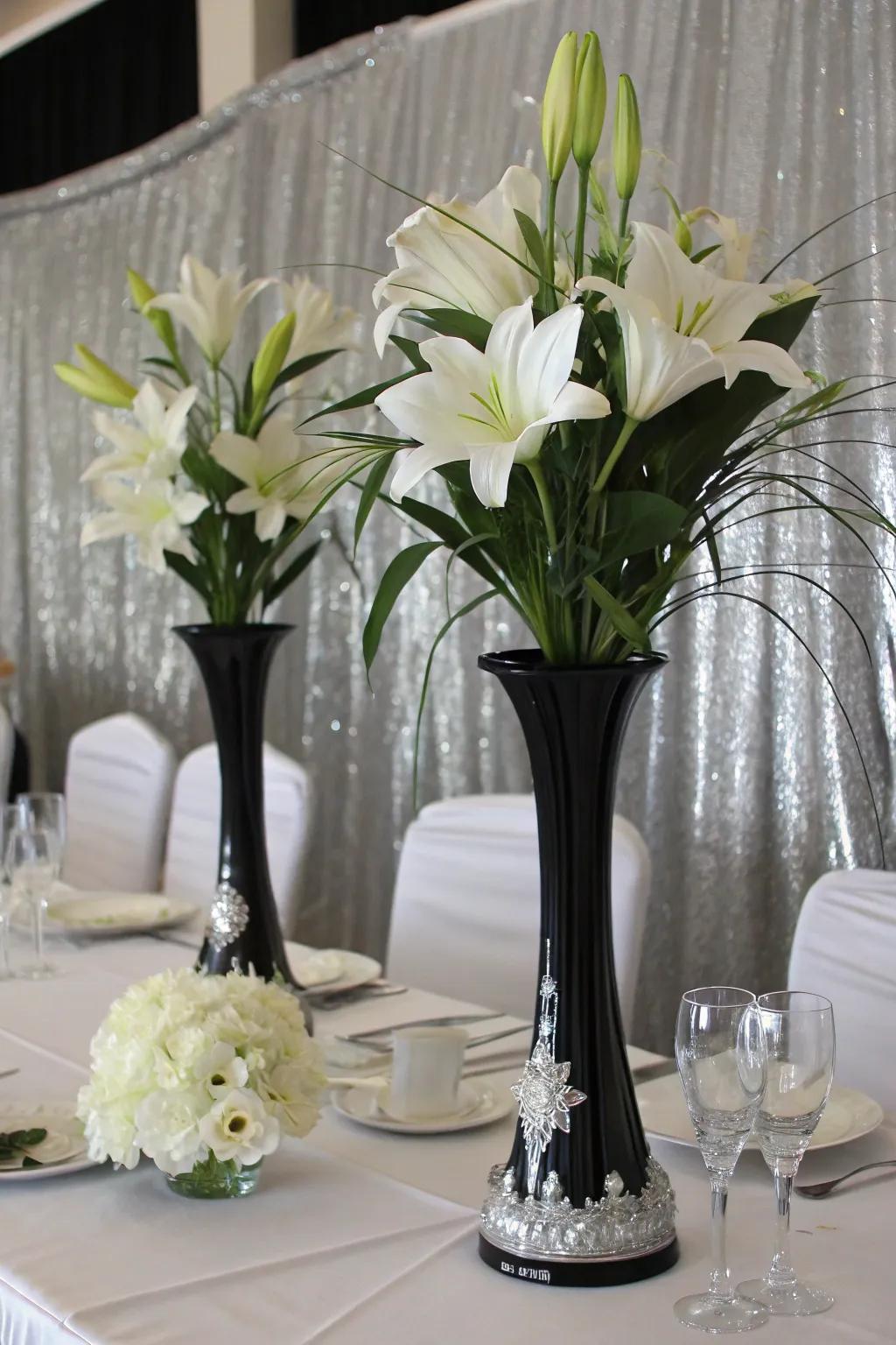 Dramatic floral arrangements with black and silver elements.