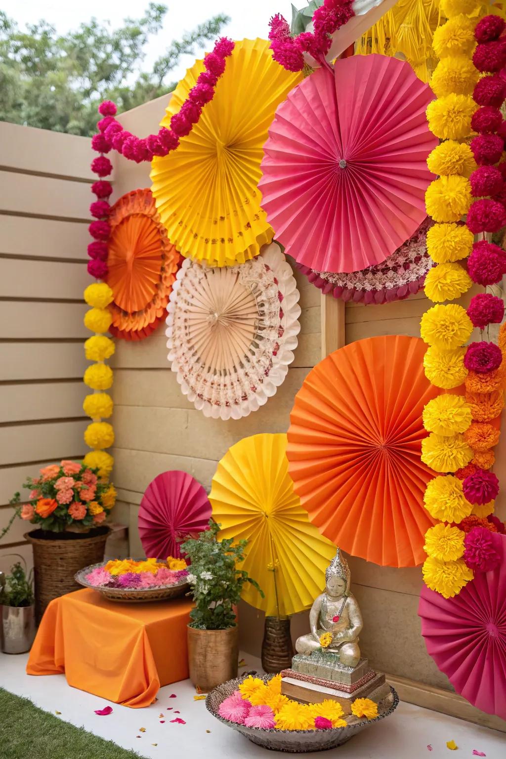 A vibrant backdrop of paper flowers and fans, adding a touch of whimsy to Ganesh Chaturthi celebrations.