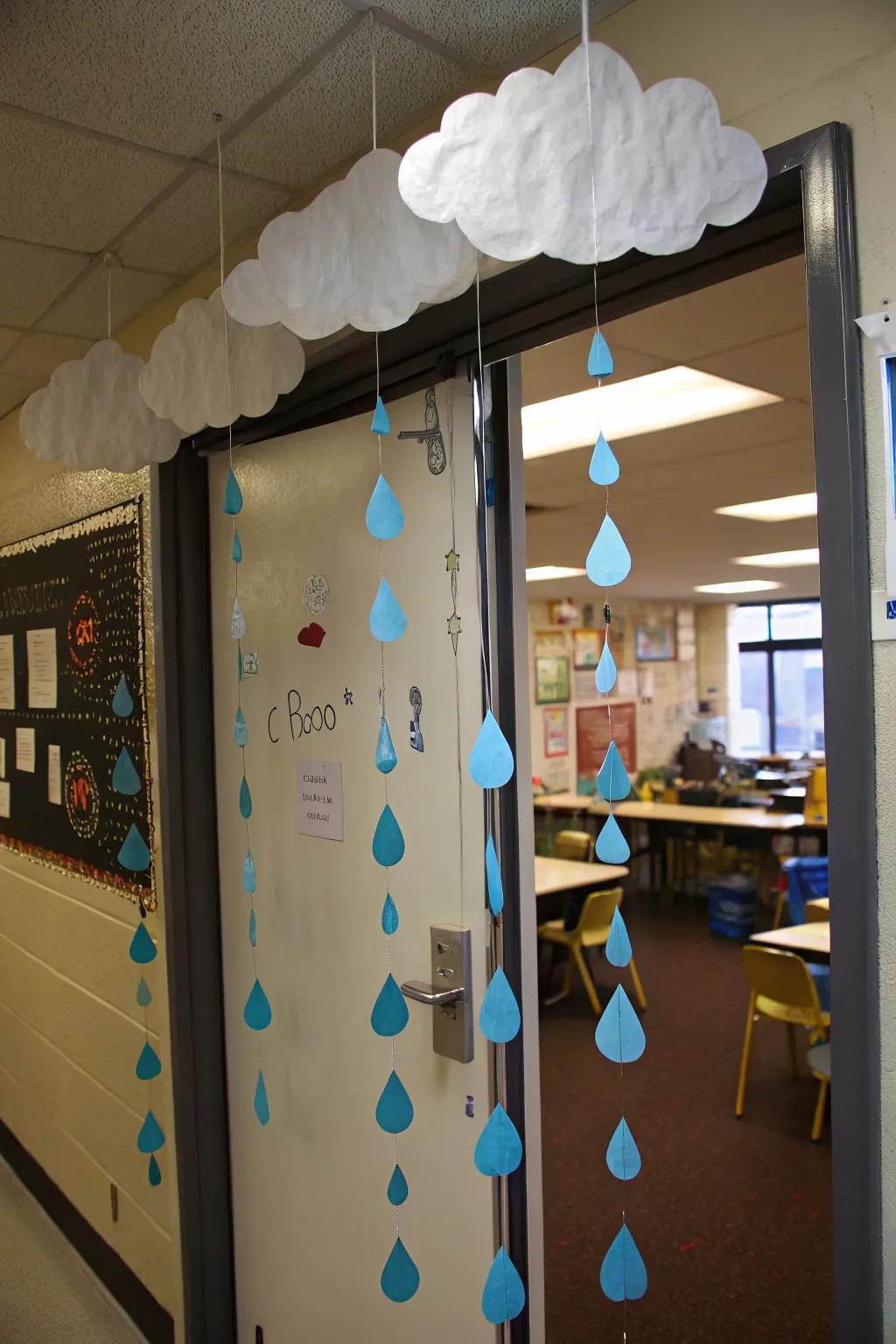 Spring showers come alive on this classroom door, complete with fluffy clouds and playful raindrops.