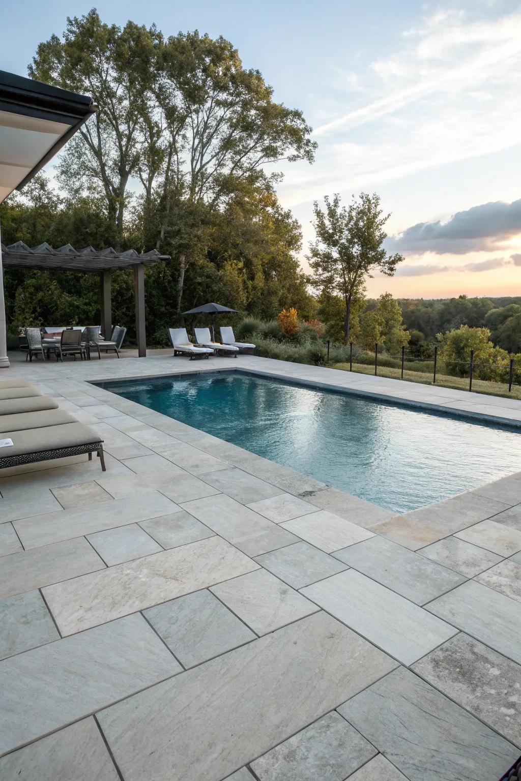 Enjoy a strong and stylish stone tile pool deck.
