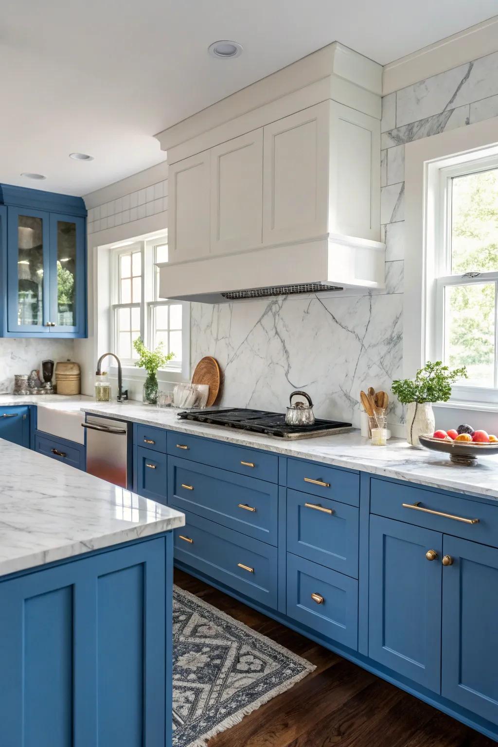 Elegance defined with blue cabinets and marble surfaces.