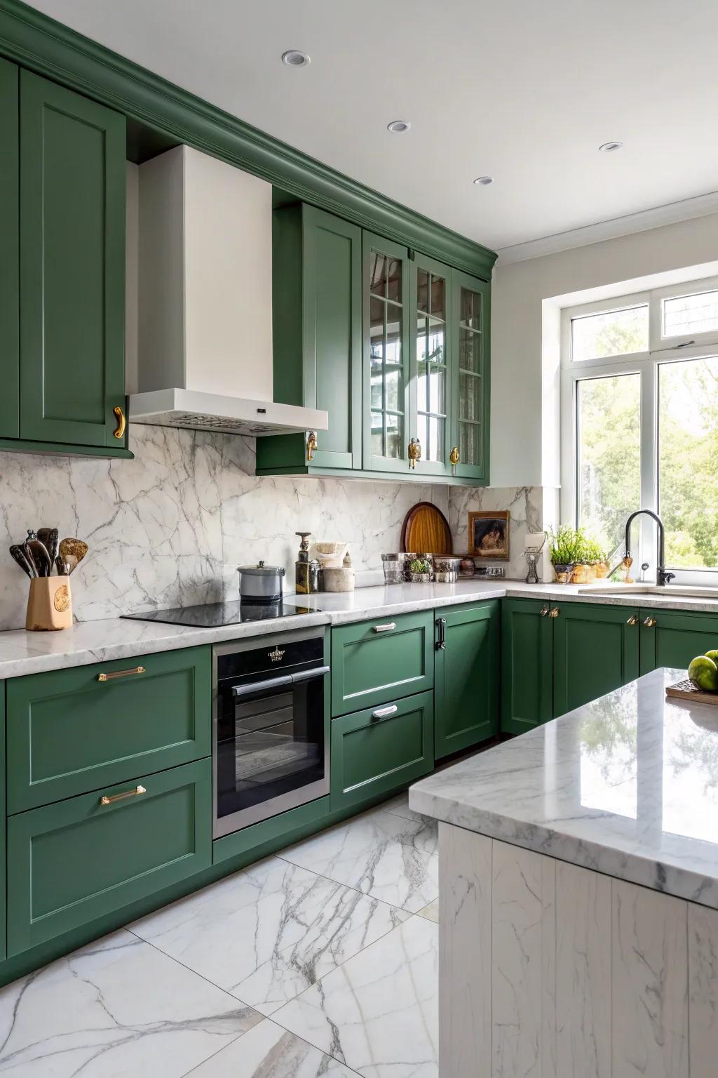 Elegant marble countertops enhancing a green kitchen.