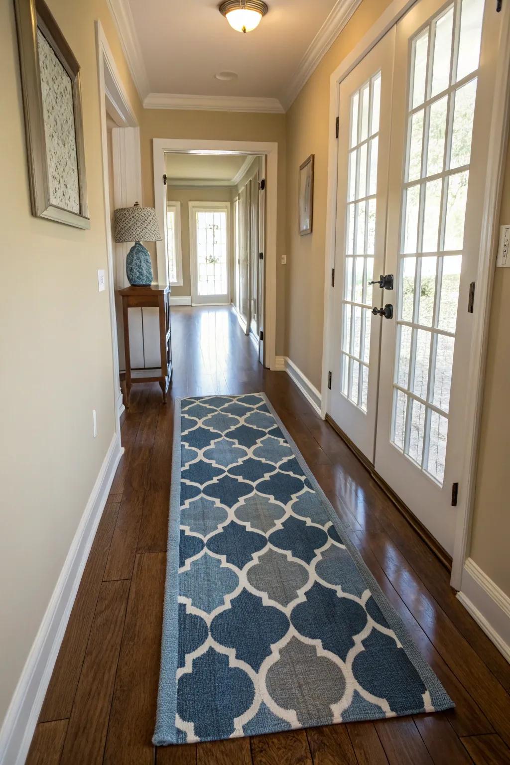 A runner rug adds warmth and a touch of color to the hallway.