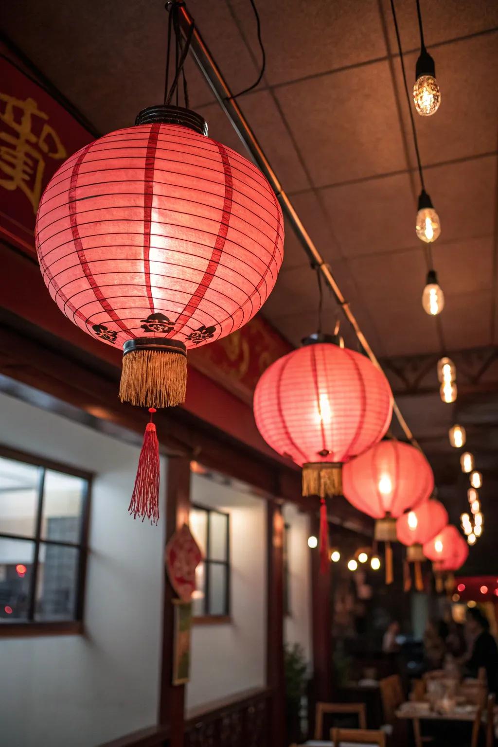 Scarlet paper lights casting a warm, inviting glow at the celebration.