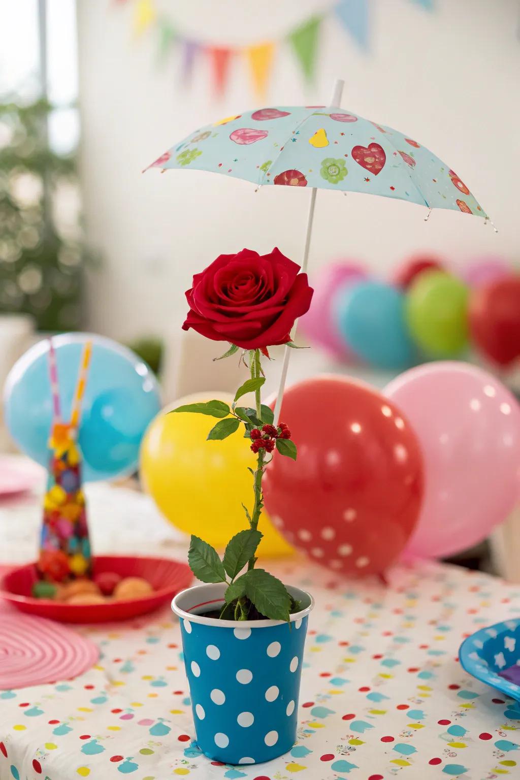 An umbrella over a rose creates a whimsical effect.